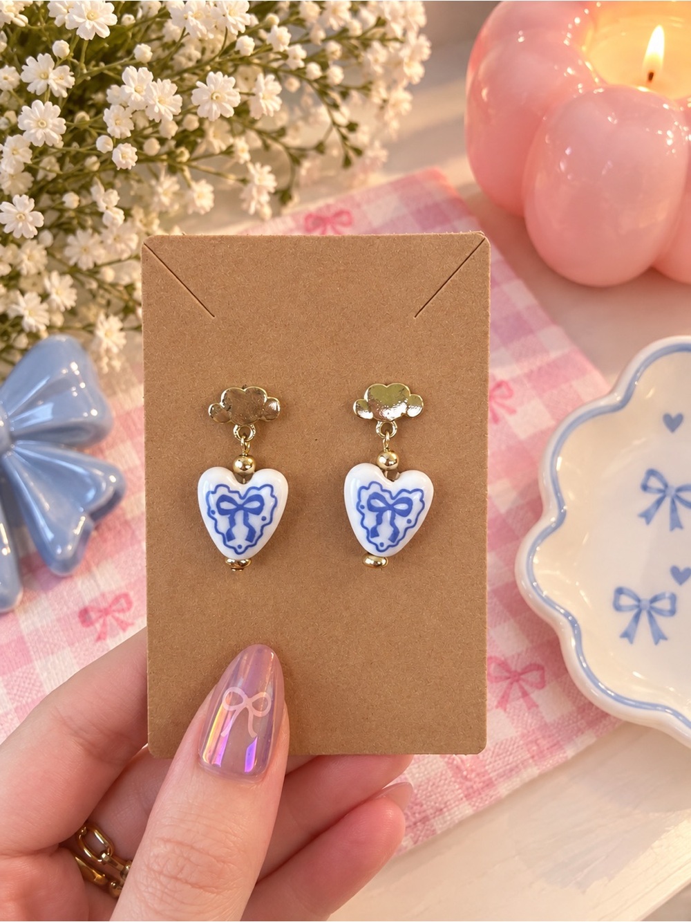 White heart with blue bow earrings